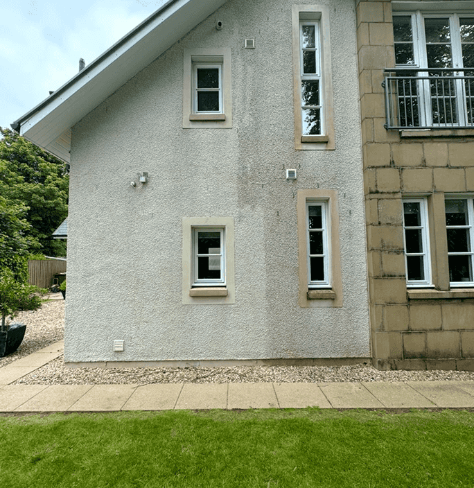 More modern type of red bricked semi detached property with a clean patio after it has been power washed